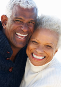 An older couple smiling together at Country Club Estates.