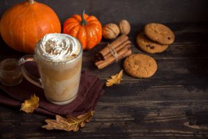 A pumpkin latte, whipped cream, and cookies make October a wonderful time of year.